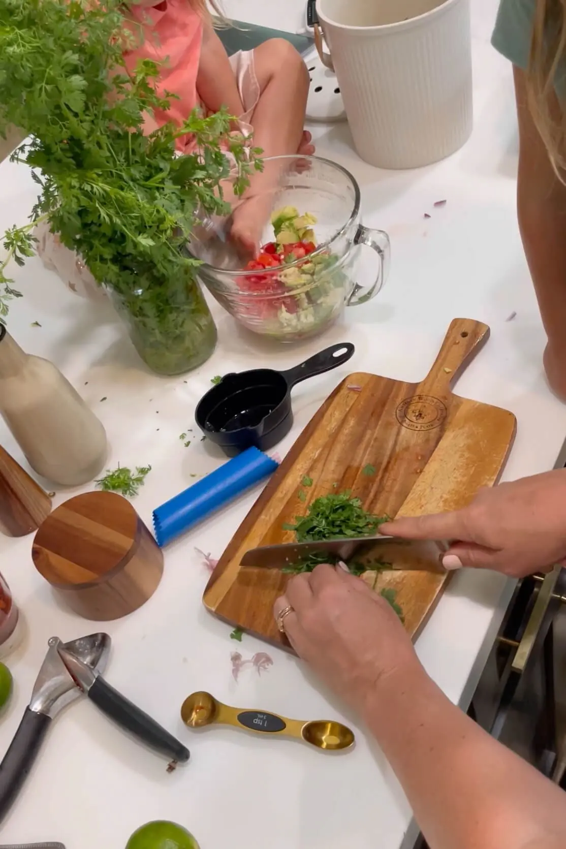 Chopping cilantro for ceviche recipe.  